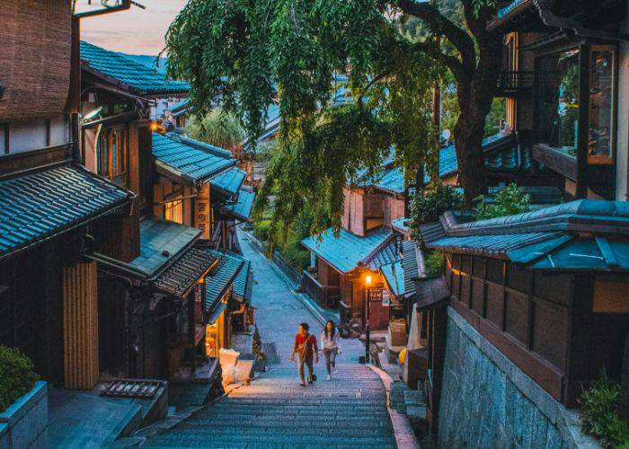 The streets of Gion. The streetlights glow against the traditional machiya of Kyoto.